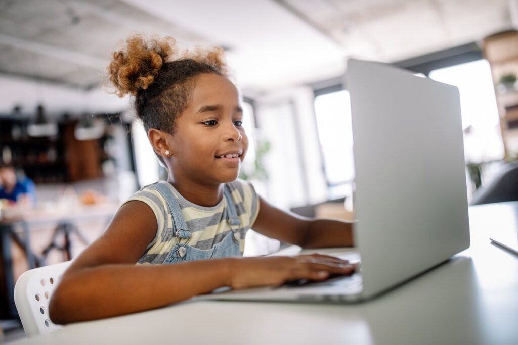 Child receiving evidence-based literacy intervention for dyslexia and reading support