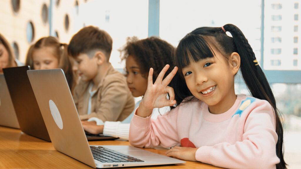 Elementary students participating in evidence-based literacy intervention for schools through online high-dosage tutoring support.